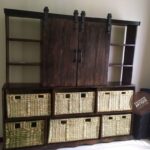 Mugavu barn door entertainment unit with papyrus storage baskets